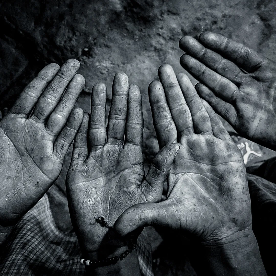 Worn palms of child labourers, campaign key visual